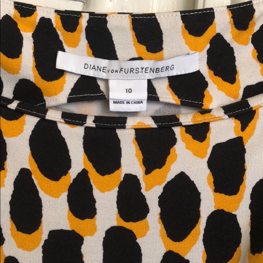 DVF orange and black animal print wrap dress 🖤🧡